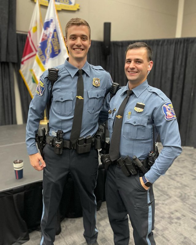 Lucas Redman and a fellow officer in Howard County Police uniforms
